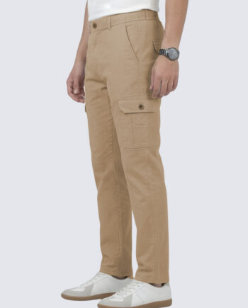 Men’s beige slim-fit cargo track pants with side flap pockets, mid-rise waist, button closure, and straight leg design paired with white sneakers, casual everyday wear style.